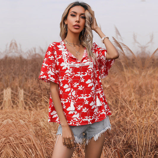 Women's floral design top with voluminous sleeves and elegant V-neck WW