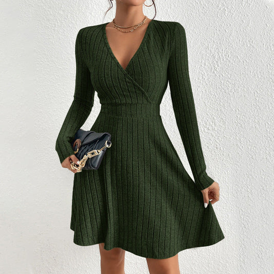 Women's knitted dress with deep V-neck and elegant long sleeves