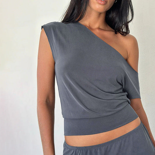 Women's asymmetric top with elegant cut and innovative details W&W