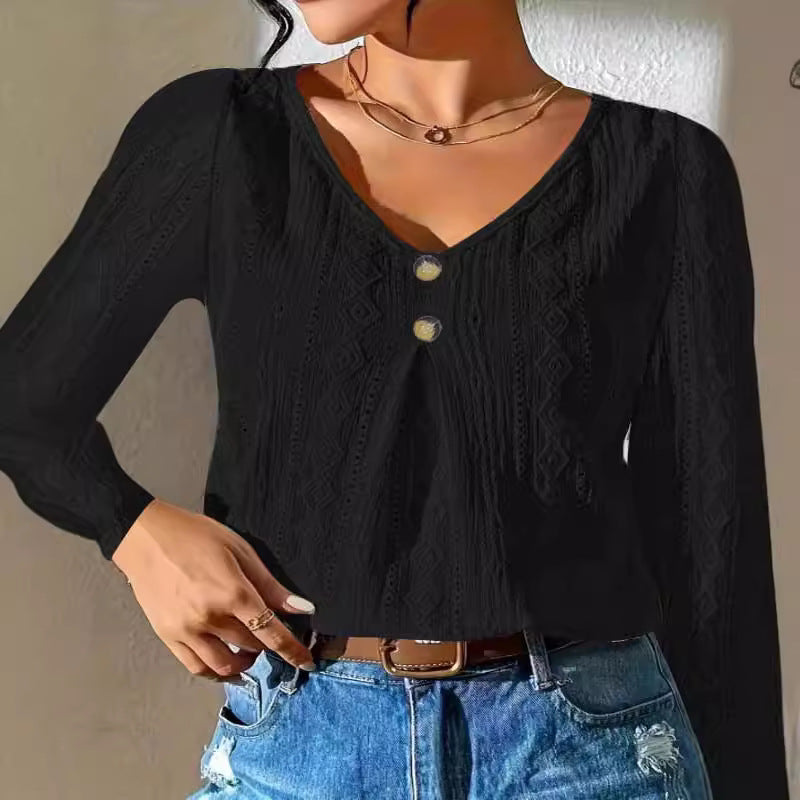 Women's blouse with decorative buttons and textured fabric WW