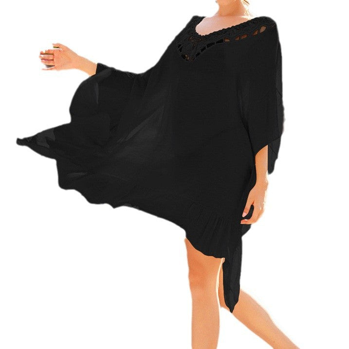 Women's beach kimono with an artistic openwork pattern and flowing cut