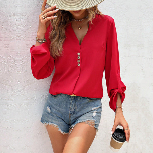 Women's blouse with elegant V-neck and sophisticated button details W&W