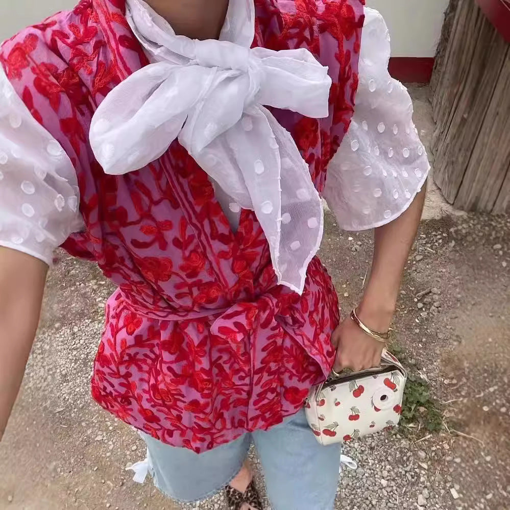 Women's kimono vest with floral pattern and tie waist belt