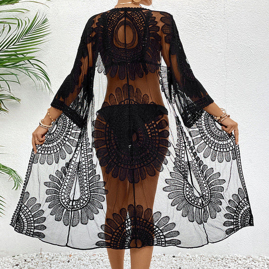 Women's chic crochet beach cover-up with voluminous sleeves and elegant design