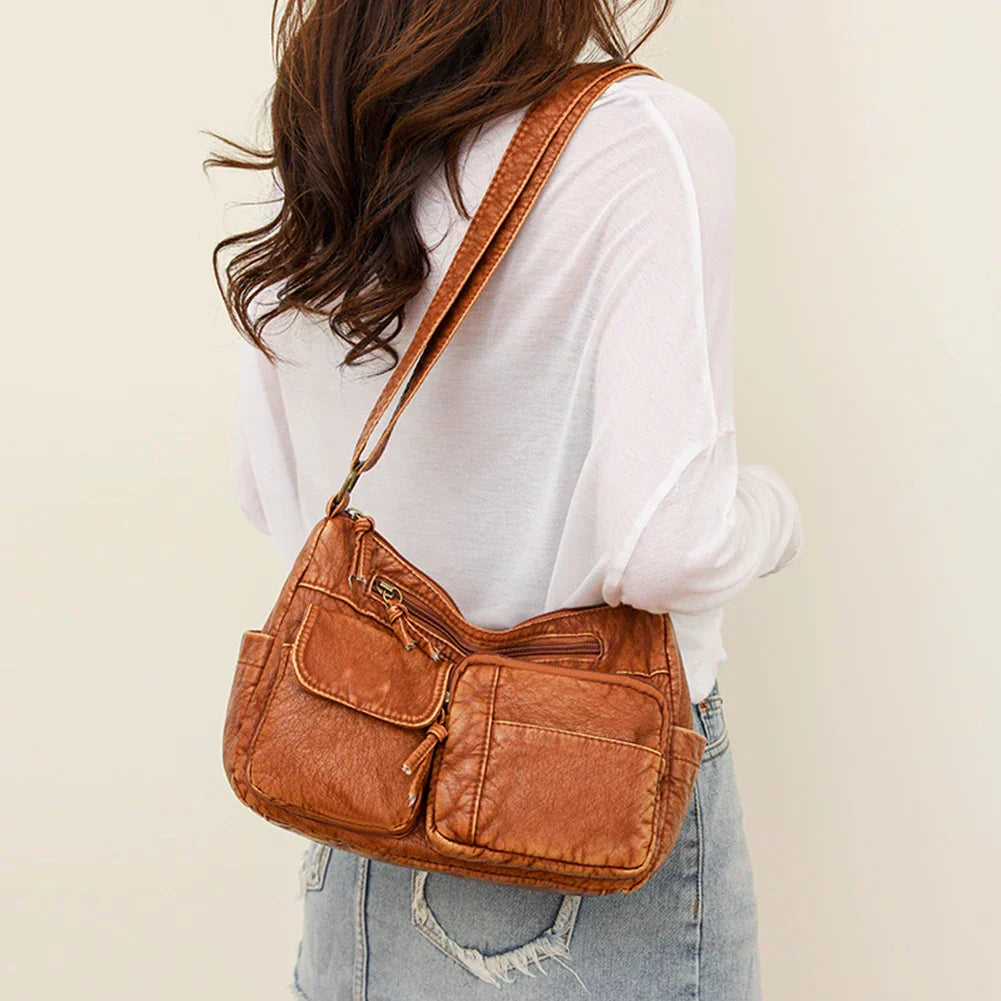 Lykke | Vintage leather shoulder bag with multiple compartments