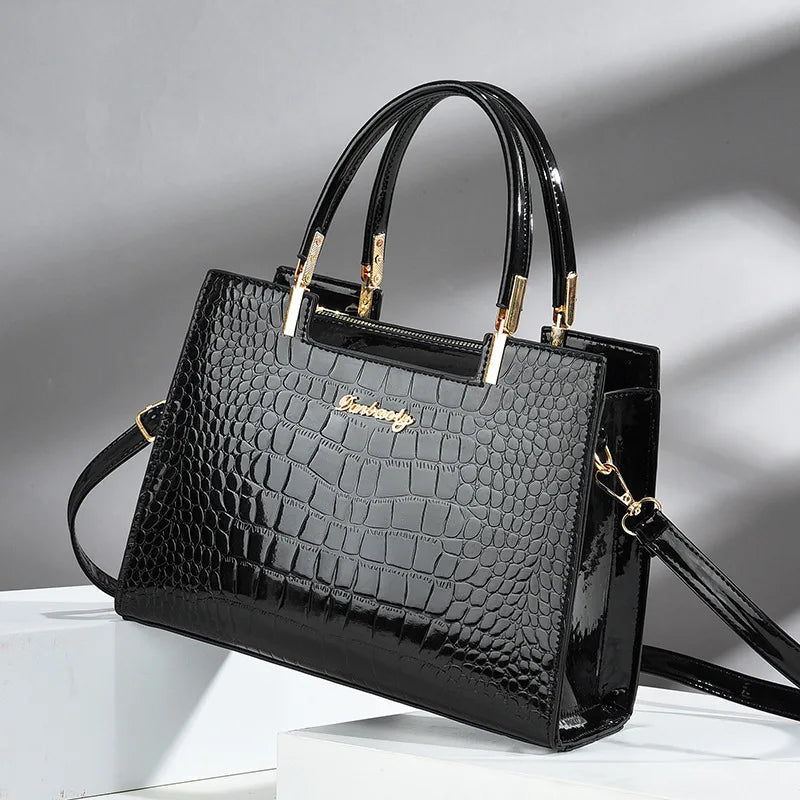 Wilja | Handbag in shiny leather with crocodile pattern