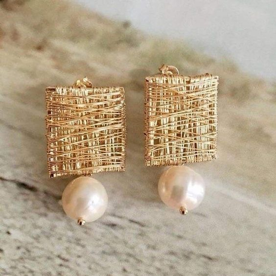 Vintage earrings made of gold threads and pearls