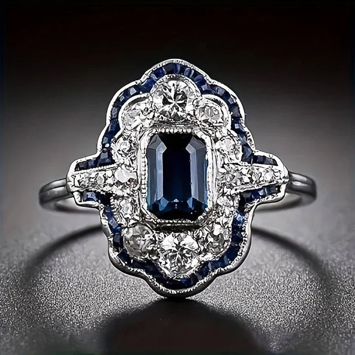 Vintage silver ring with blue crystal