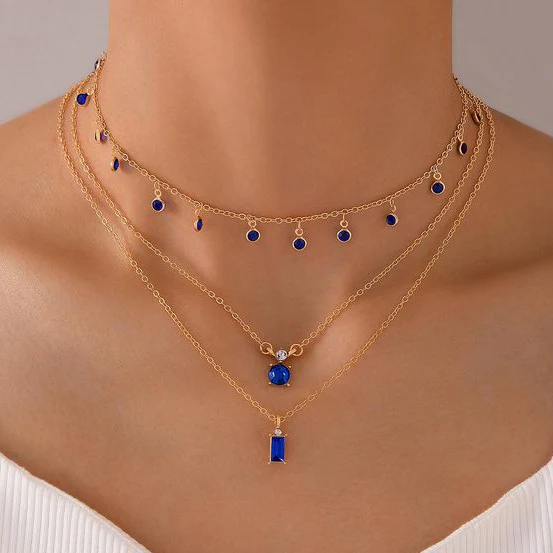 Vintage gold necklace with blue zirconias